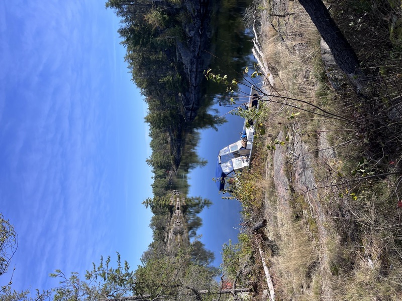 Charter boat docked in a scenic cove on Lake Nipissing