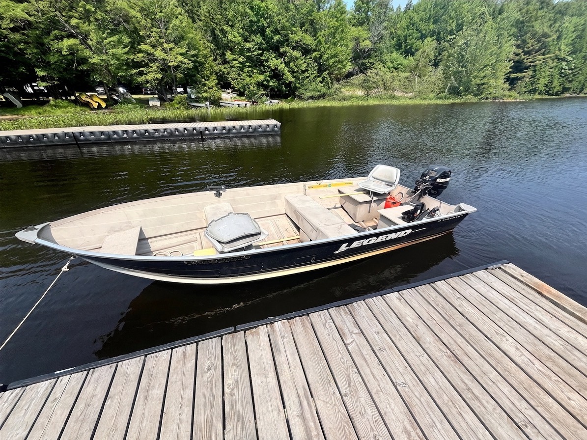 16-foot Legend fishing boat with 20hp motor docked at Lake Nipissing Outfitters